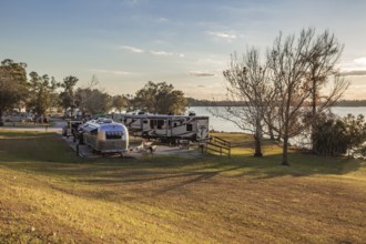 Recreational vehicles parked on the bank of Lake Seminole in the Corps of Engineers Eastbank