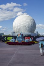 Sign in front of the Spaceship Earth geodesic sphere near entrance to the Food and Wine Festival in
