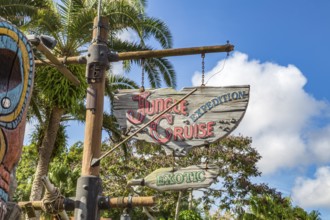 Sign for the Jungle Cruise Expedition attraction in the Adventureland area of the Magic Kingdom at