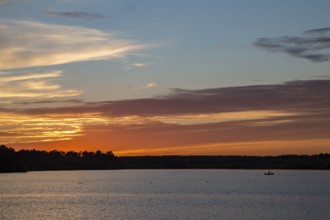 Sun setting over the lake at Little Black Creek campground near Lumberton, Mississippi