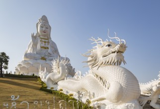 Chinese dragons line the steps up to the Guan Yin (Goddess of Mercy) statue at Wat Huay Pla Kang