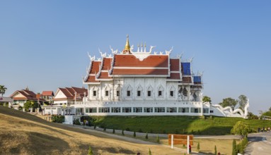 Bamboo scaffolding installed for roof repairs at the Viharn assembly hall at Wat Huay Pla Kang in