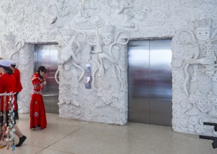 Ornate carvings on the walls at the Guan Yin (Goddess of Mercy) statue at Wat Huay Pla Kang Temple