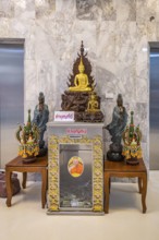 Buddahist shrine inside the Guan Yin (Goddess of Mercy) statue at Wat Huay Pla Kang Temple in