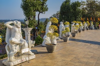 Statues around the perimeter of the Guan Yin (Goddess of Mercy) statue at Wat Huay Pla Kang Temple