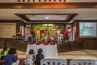 Praise team performing at the Baan Athitaan Church and Grace Language School in Chiang Rai,