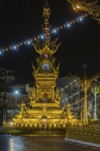Clock Tower of Chiang Rai monument designed by local artist Chalermchai Kositpipat to honor the