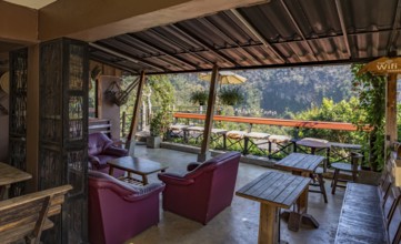 Stairs lead down to the Doi Phamee coffee shop and restaurant in Mae Sai district of Chiang Rai,