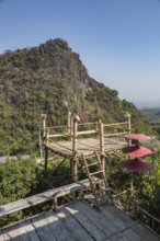 Bamboo overlook platform provides unobstructed view of the hillside at Pha Mi Village in Mae Sai