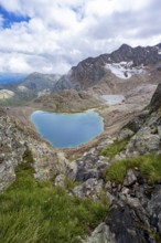 High mountain landscape, view of mountains with mountain lake Vogelhüttensee, Stubai Alps, South