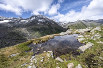 Small mountain lake, Roter Knopf mountain peak, Vienna High Trail, Schober Group, Hohe Tauern