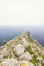 Rocky peninsula with a sea view to the horizon on a desolate sea in the summer, Crozon peninsula,
