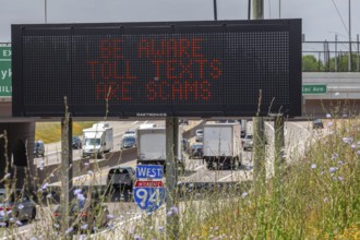 Detroit, Michigan - A message on an electronic road sign on Interstate 94 warns drivers about