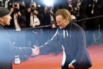 Cannes, France - 16.5.2024: The Edge and Bono of the 78th Cannes International Film Festival on the