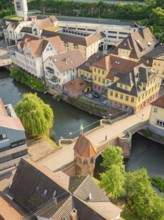 Picturesque town view with river and half-timbered houses next to a stone bridge, Calw, Black
