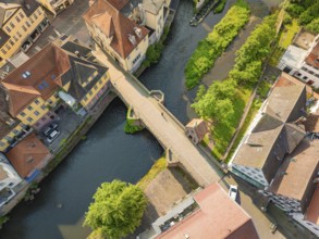 Aerial view of a bridge over a river with colourful roofs, Calw, Black Forest, Germany