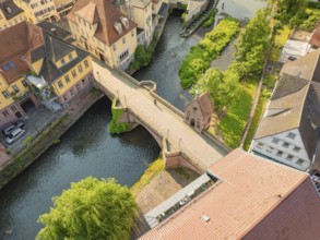 Historic town with river and bridge, surrounded by green landscapes, Calw, Black Forest, Germany