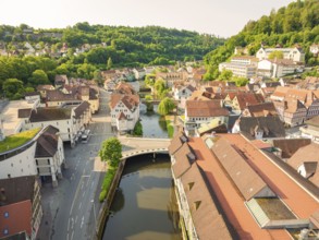 Aerial view of a picturesque town with red tiled roofs and a river, Calw, Black Forest, Germany