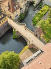 A historic bridge over a quiet river in a picturesque town, Calw, Black Forest, Germany
