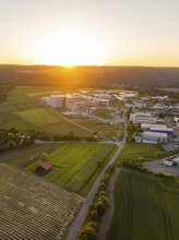 Paisage at sunset with fields and industry, surrounded by hills, Calw, Black Forest, Germany