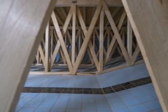 Wooden construction with geometric pattern and blue and white tiles, historical art exhibition in
