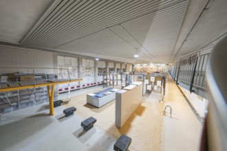 Exhibition space with works of art, bright light and modern architecture, historical art exhibition