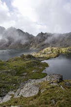Mountain lakes Wangenitzsee and Kreuzsee, cloudy mountain peaks in the morning, Schober group, Hohe