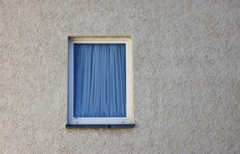 House facade, window with blue curtain, Steyr, Upper Austria, Austria