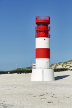 Red and white lighthouse Helgoland dune on the south beach, Helgoland dune, Helgoland island, North