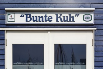 Blue lobster shack, wooden façade with window, rustic fish restaurant, façade detail in the