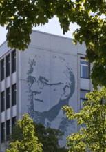 Vocational school centre Mitte Peter-Behrens-Schule with the portrait of Peter Behrens on the
