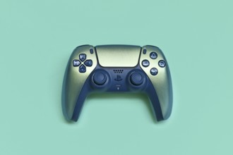 Germany - May 2025: Sony DualSense Wireless Playstation 5 Controller in Chroma Teal color on