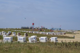 Beach chairs on the family lagoon, Perlebucht, Büsum, North Sea, Schleswig-Holstein, Germany