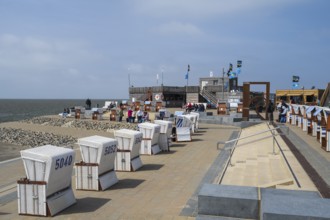 Beach chairs on the promenade, family lagoon, Perlebucht, Büsum, North Sea, Schleswig-Holstein,