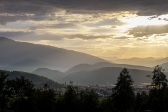 Sunset, evening mood over the Puster Valley, near Bruneck, South Tyrol, Italy
