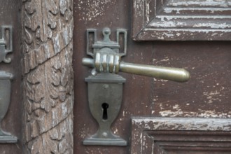 Art Nouveau door handle around 1900 on a front door, Bavaria, Germany