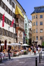 Street cafés on Herzog-Friedrich-Strasse in the old town centre with the Golden Roof, Innsbruck,