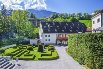 Castle garden of Ambras Castle on the outskirts of the city in front of the Patscherkofel 2246m,