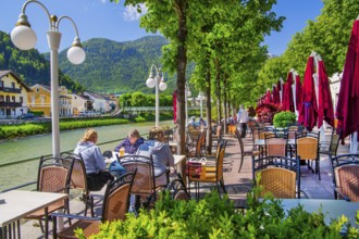 Café terrace of the GranCafe Zauner on the banks of the Traun, Bad Ischl, Trauntal, Salzkammergut,