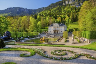 Water parterre with the portal of Linderhof Castle in spring, municipality of Ettal, Ammergau Alps,