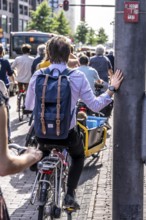 Central cycle path on the Lange Viestraat, lanes for pedestrians, cyclists and local traffic are