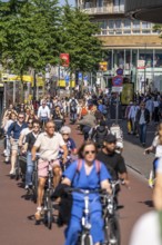 Central cycle path along the Vredenburg, in the city centre of Utrecht, lanes for pedestrians,