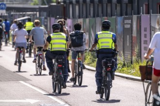Central cycle path on the Vredenburg, in the city centre of Utrecht, lanes for pedestrians,