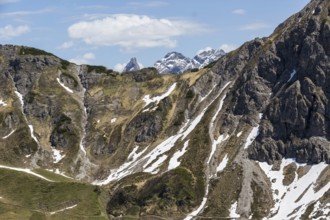 Dramatic rocky landscape with snow-capped peaks in Kleinwalsertal, Austria