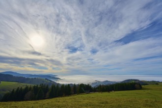 Sunny landscape with hills, forests and a dense cloud cover, Schauinsland, Freiburg im Breisgau,