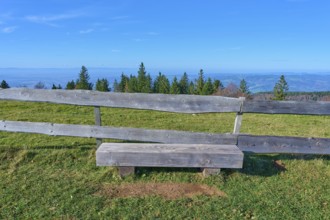 Wooden bench, on the Kandel Höhenweg, with a wide view over wooded landscape, Kandel, Waldkirch,
