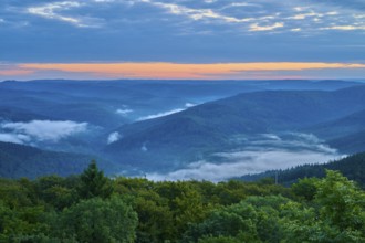 Mountain landscape with fog in the valleys at sunrise, blue sky, Katzenbuckel, Waldbrunn,