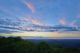 Twilight with pastel-coloured clouds over a green landscape, Katzenbuckel, Waldbrunn,