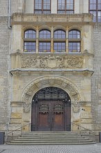 Portal with city coat of arms, town hall built in 1901, decorations, windows, Dessau,