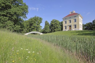 UNESCO Luisium, classicist palace with arched bridge, pond, reeds, idyll, Dessau-Wörlitz Garden